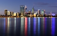 Perth, Western Australia, viewed at night reflected in the Swan River. &copy; Robyn Mackenzie 