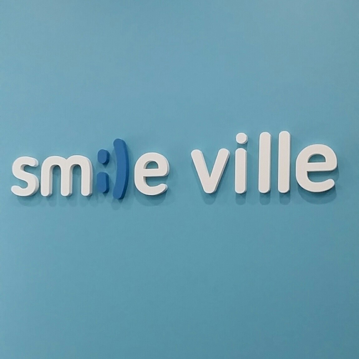 Smile Ville - Dentist Mill Park Logo
