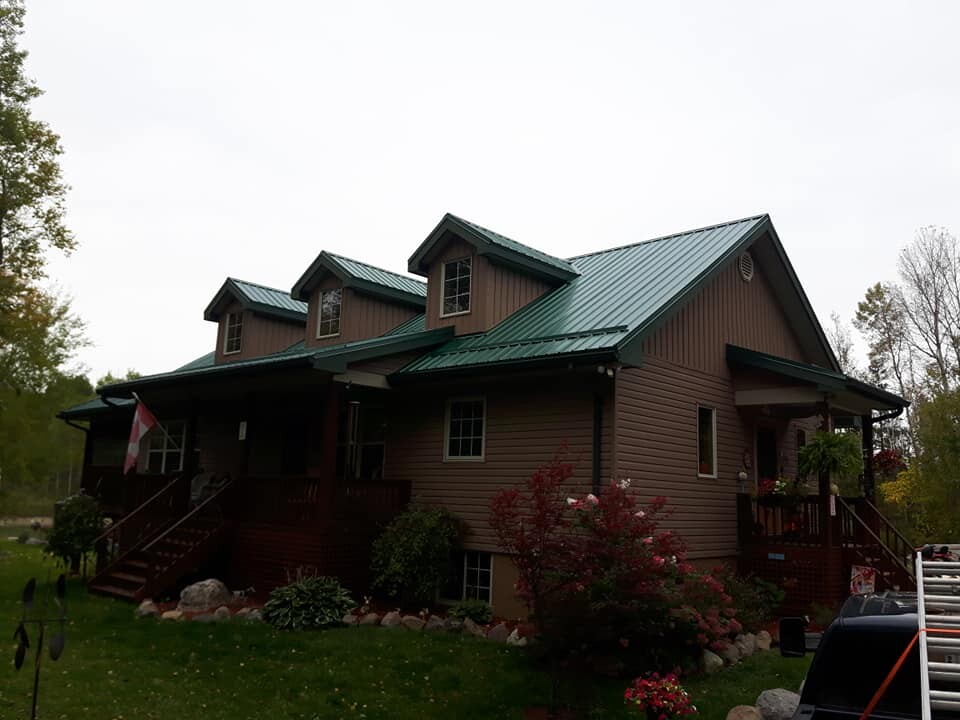 MTC ROOFING AND EXTERIORS Logo
