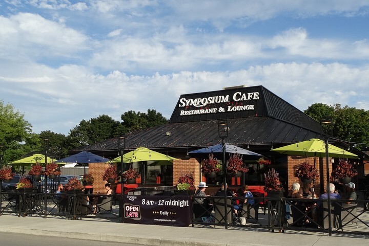 Symposium Cafe Restaurant Cobourg Logo