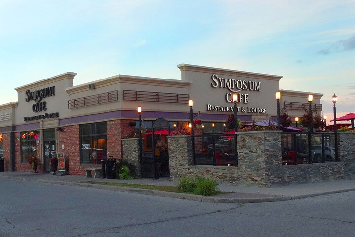 Symposium Cafe Restaurant Bolton Logo