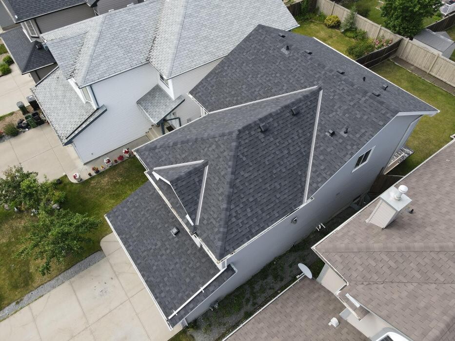 Images Roomi's Roofing