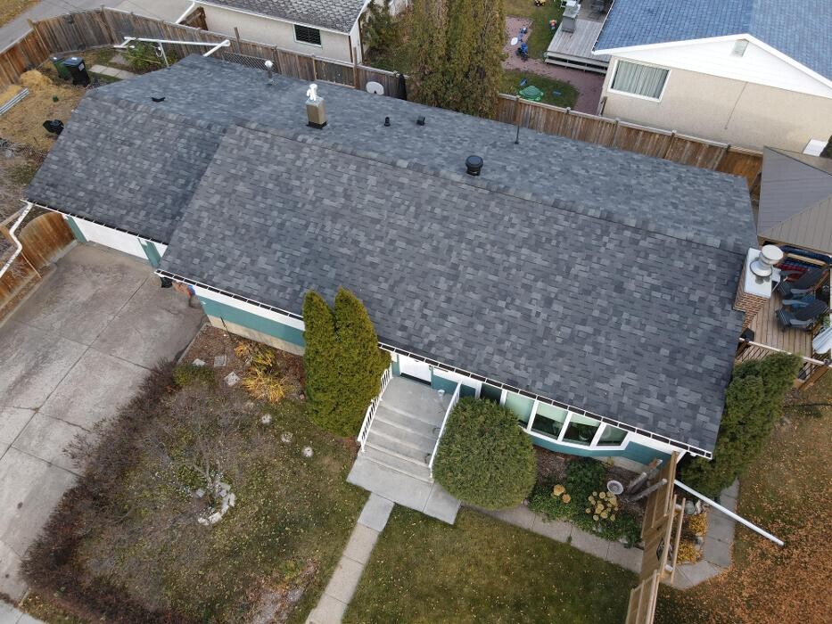 Images Roomi's Roofing