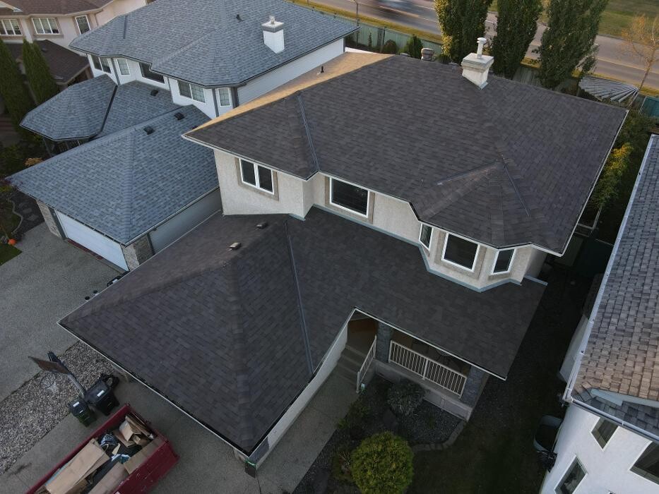 Images Roomi's Roofing