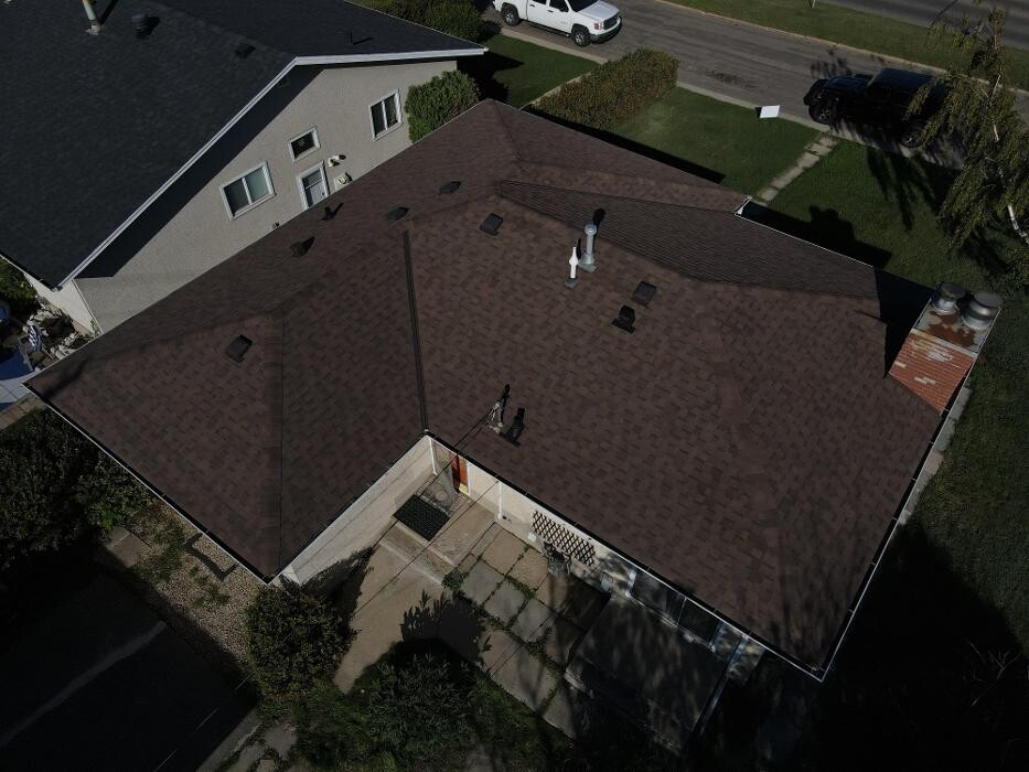 Images Roomi's Roofing
