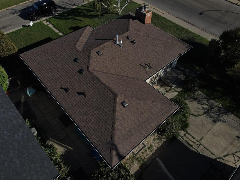 Images Roomi's Roofing