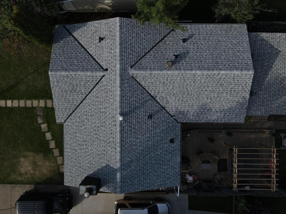 Images Roomi's Roofing