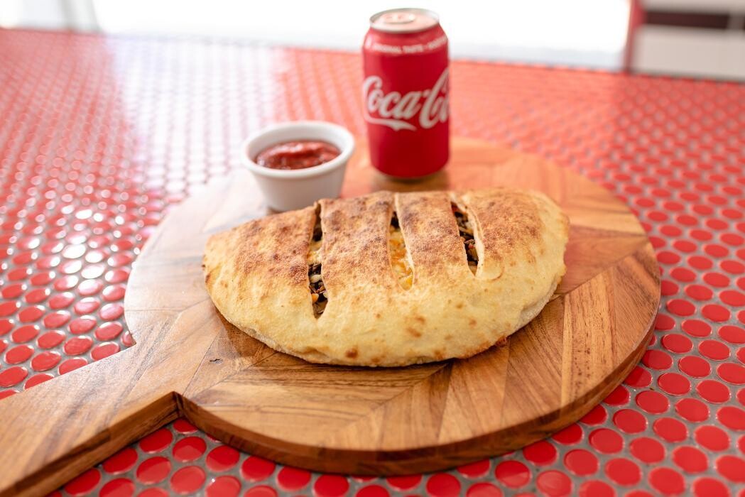 Images New Orleans Pizza