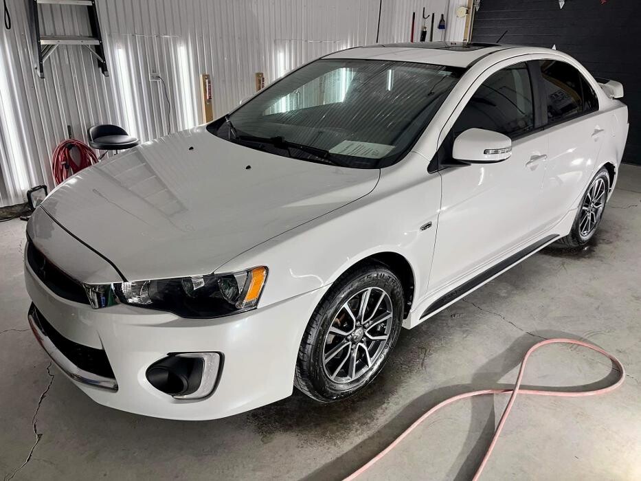 Images Excellence Auto Acton Inc