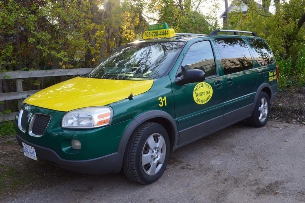 Images Deluxe Taxi