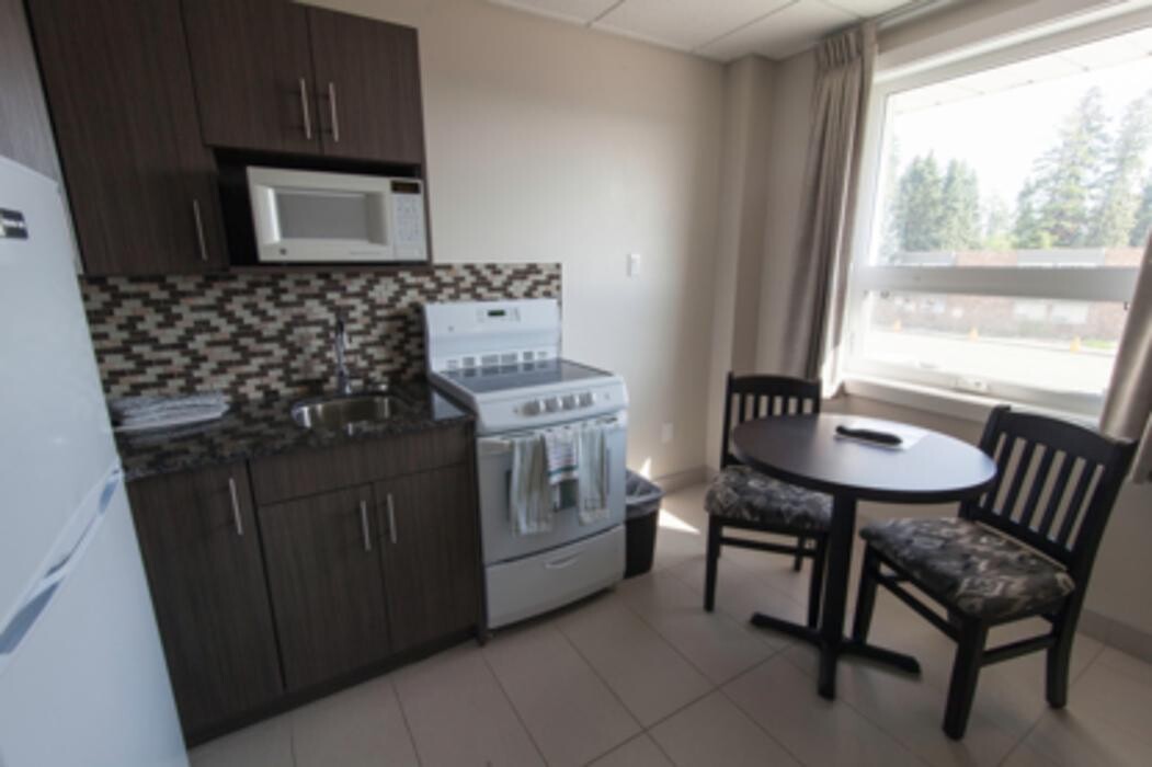 Images Guest House Inn & Suites