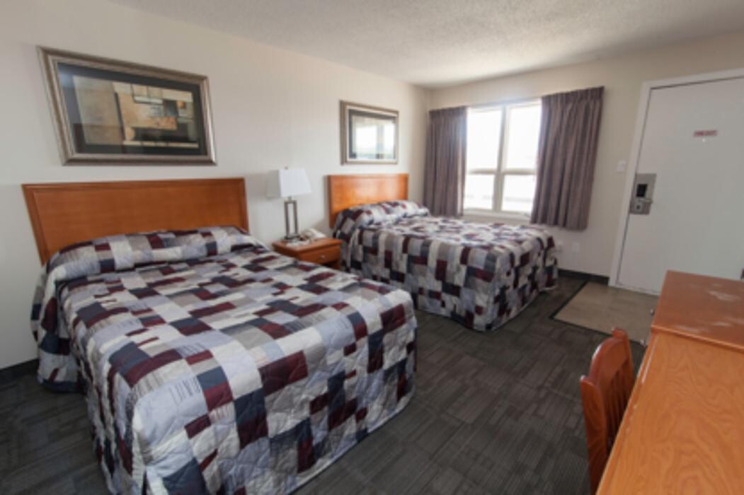 Images Guest House Inn & Suites