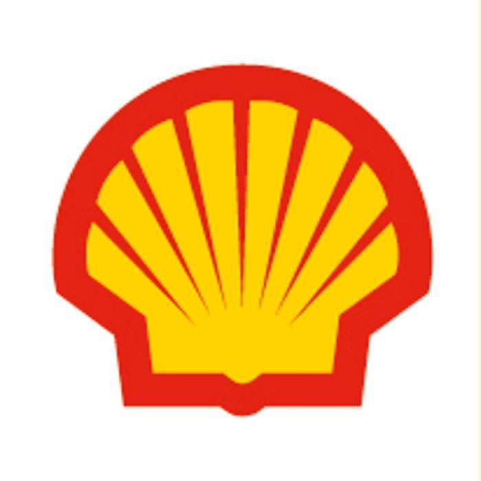 Migrol Auto Service mit Shell-Treibstoff Logo