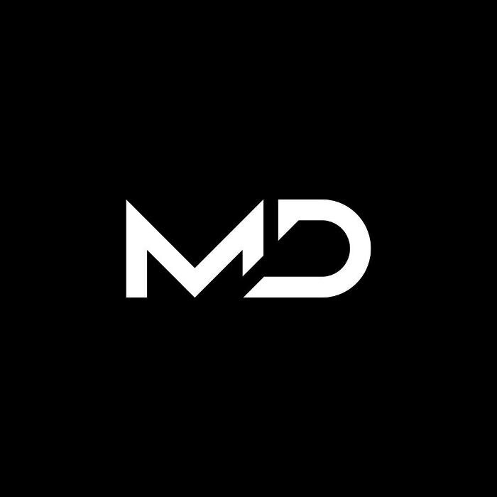 M&D exclusive cardesign Logo