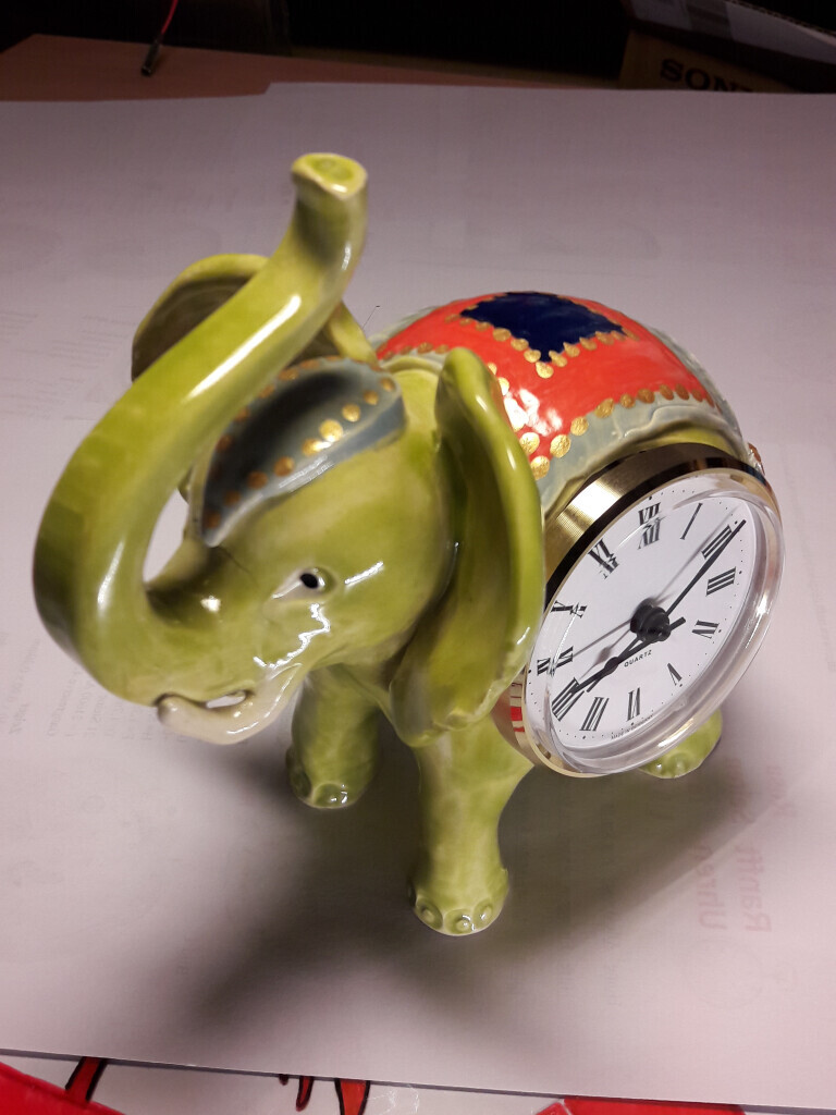 Bilder Your-Time, der kreative Uhrmacher