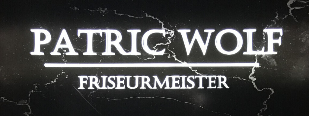 Patric Wolf Friseurmeister Logo