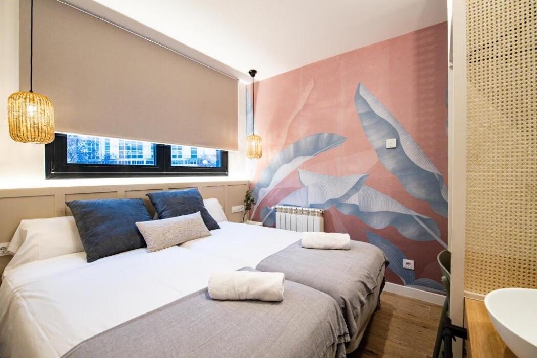 Images Apartamentos Home 42 by gaiarooms