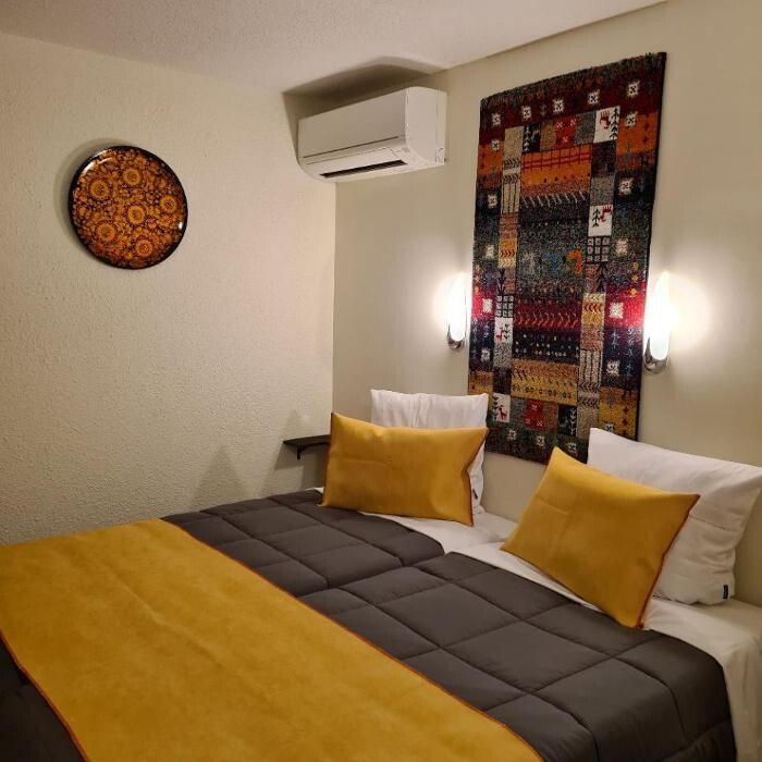 Images Hôtel L'Etoile Aéroport - A61