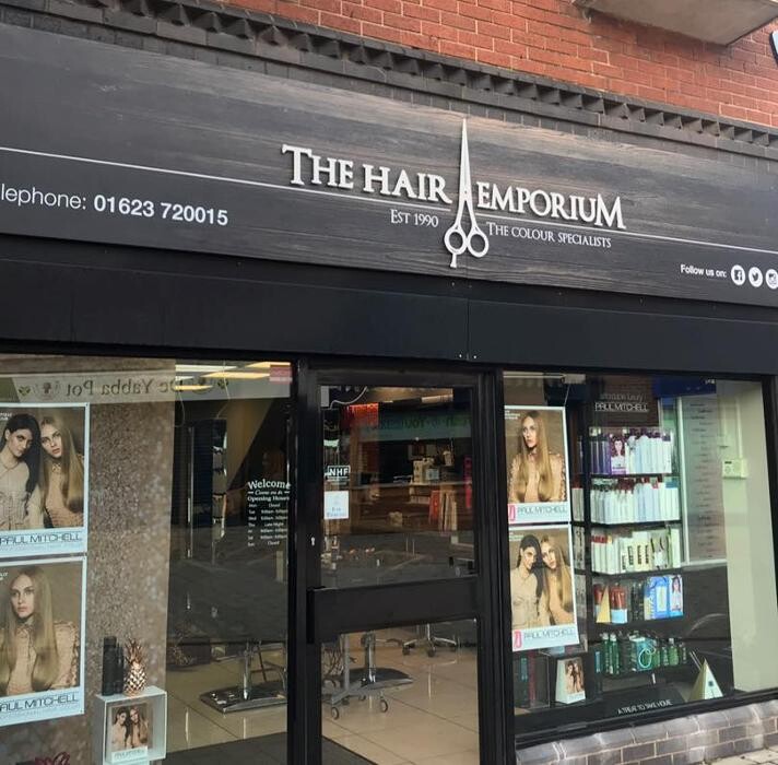 The Hair Emporium Logo