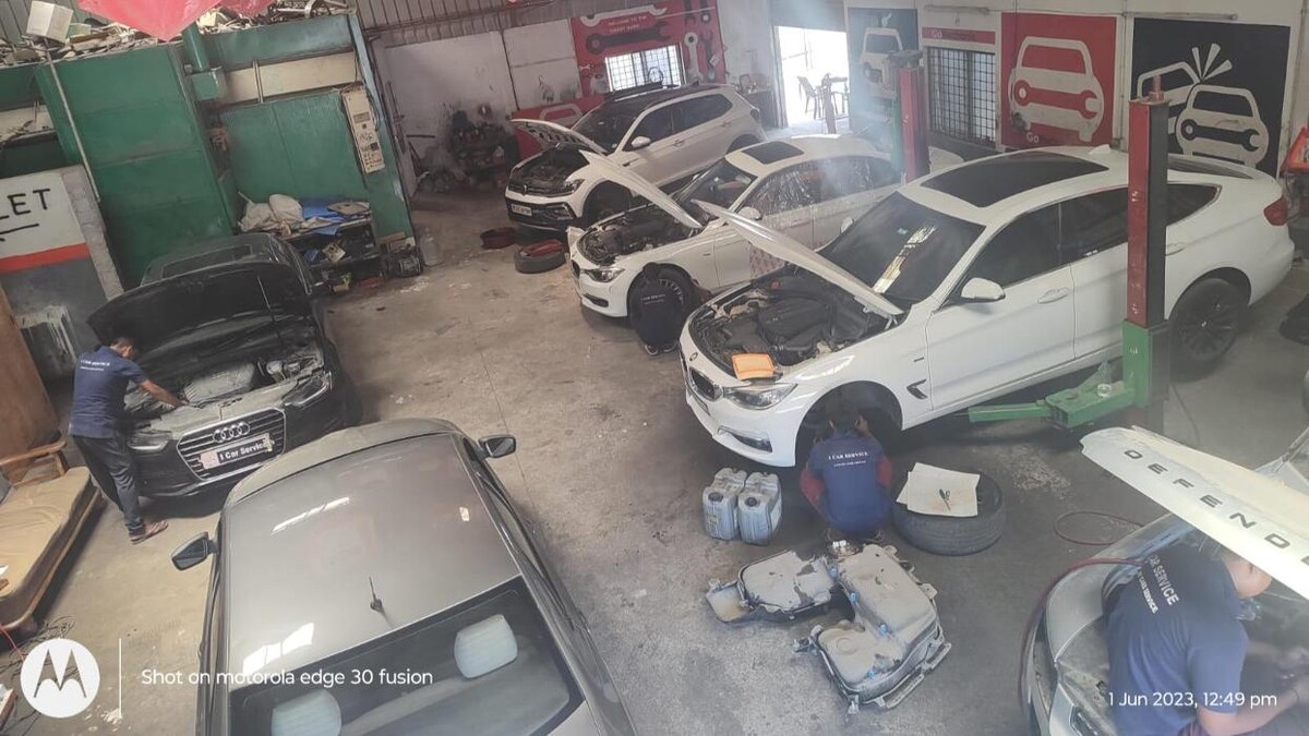 Images i Car Service -The Premier Car Service Center