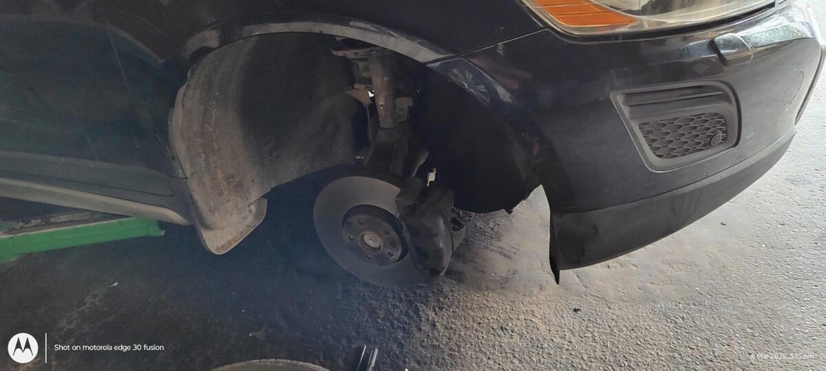 Images i Car Service -The Premier Car Service Center