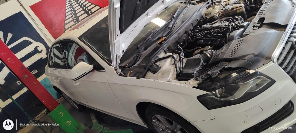 Images i Car Service -The Premier Car Service Center