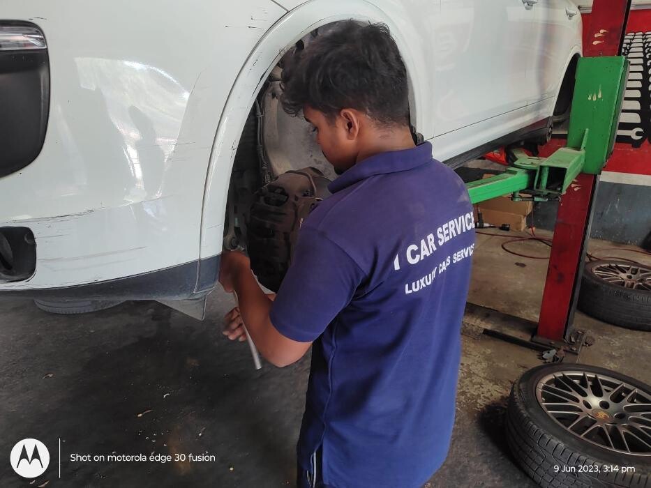 Images i Car Service -The Premier Car Service Center