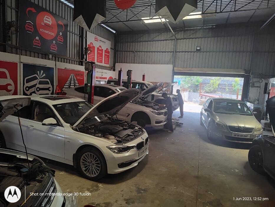 Images i Car Service -The Premier Car Service Center