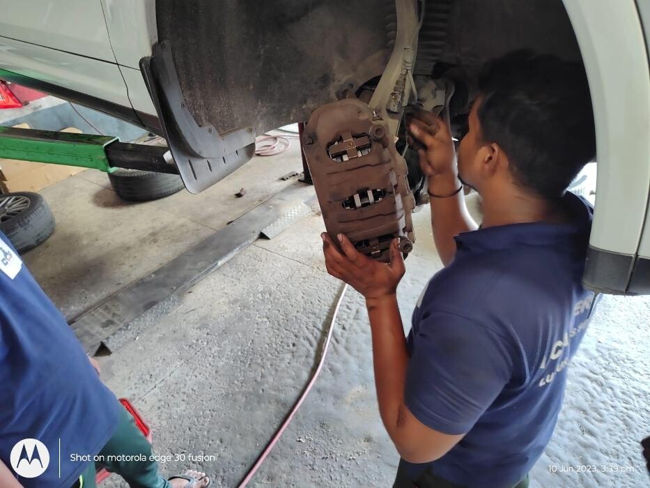 Images i Car Service -The Premier Car Service Center