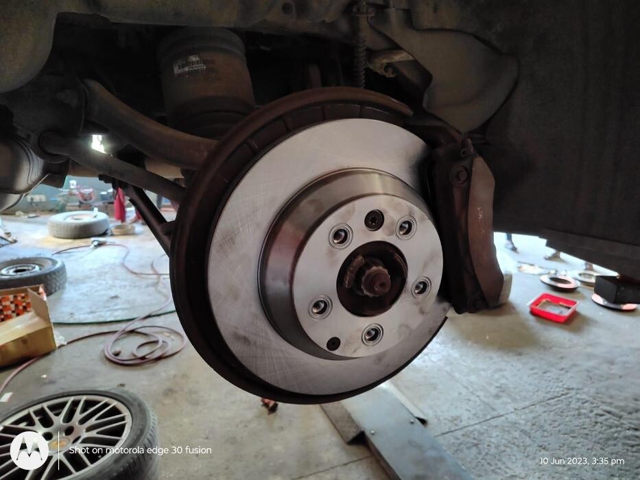 Images i Car Service -The Premier Car Service Center