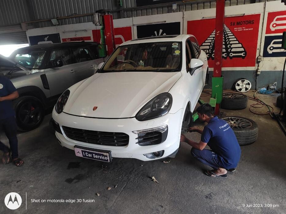 Images i Car Service -The Premier Car Service Center