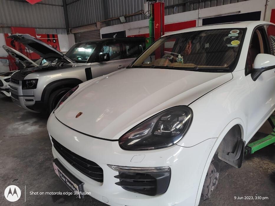 Images i Car Service -The Premier Car Service Center