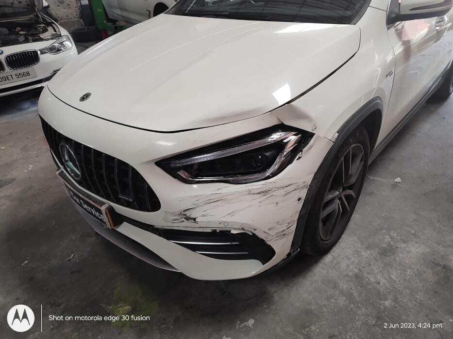 Images i Car Service -The Premier Car Service Center