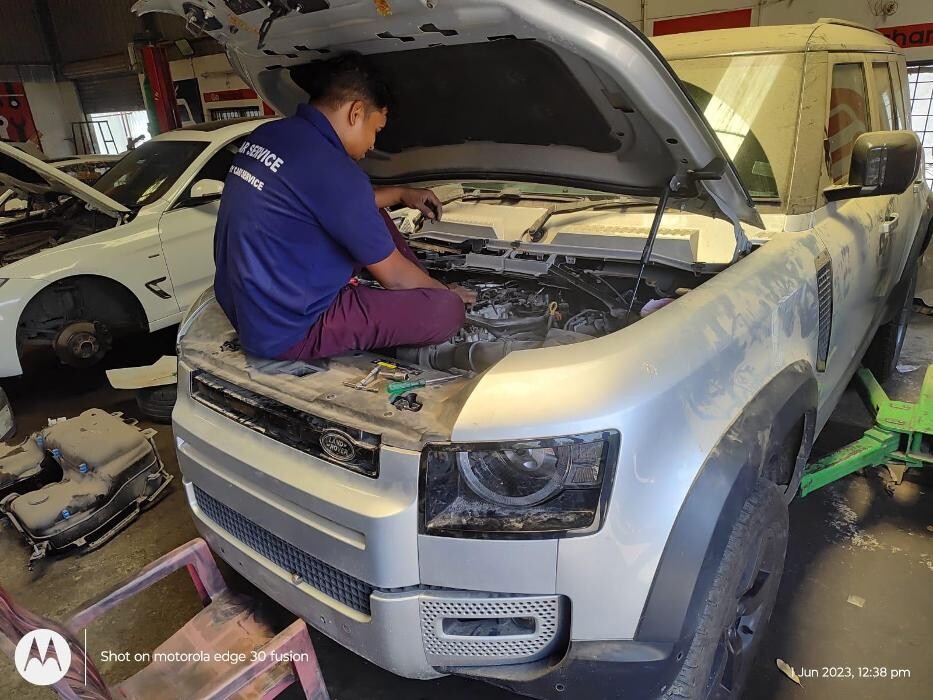 Images i Car Service -The Premier Car Service Center