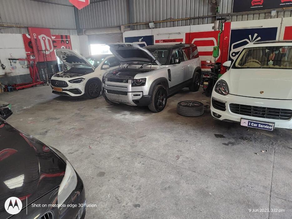 Images i Car Service -The Premier Car Service Center