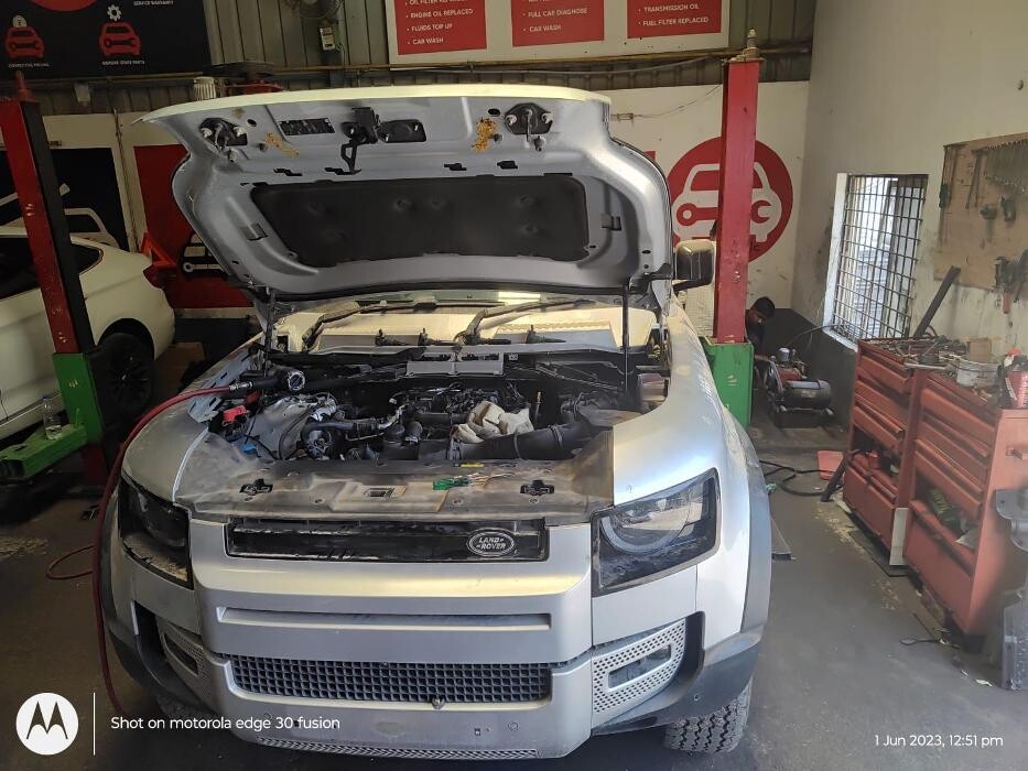 Images i Car Service -The Premier Car Service Center