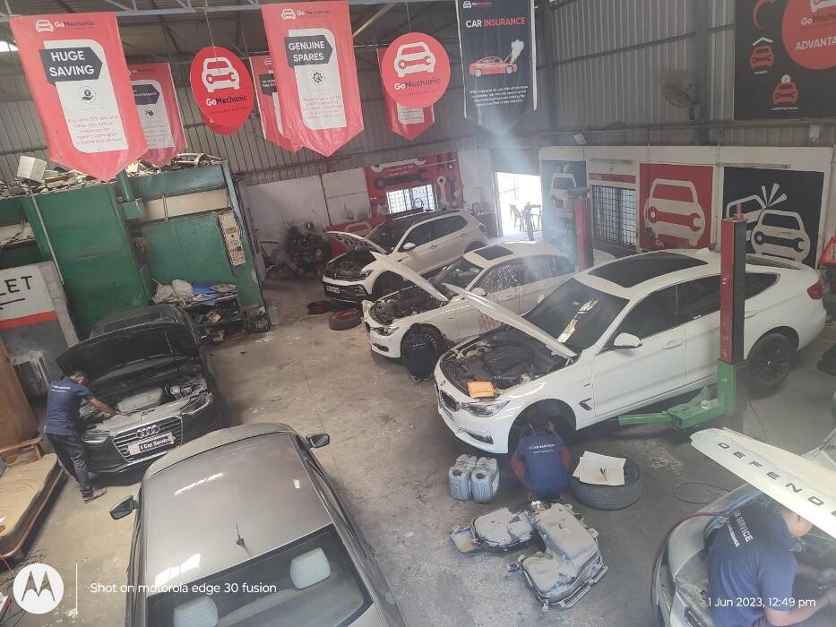 Images i Car Service -The Premier Car Service Center