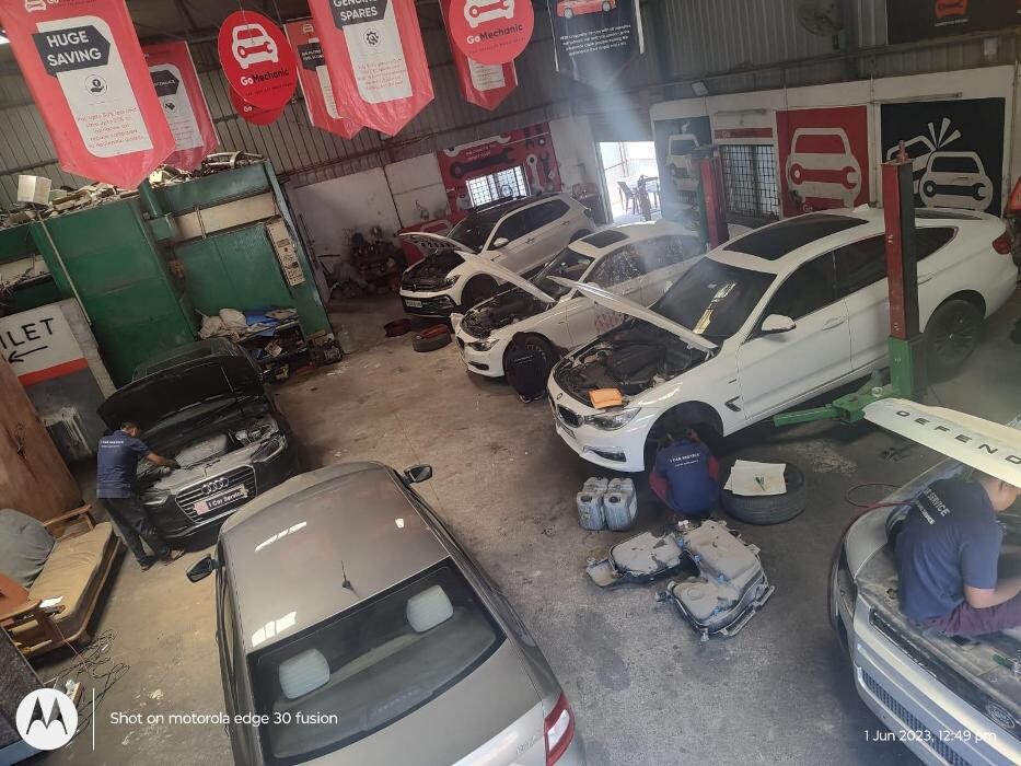 Images i Car Service -The Premier Car Service Center