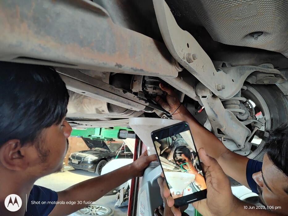 Images i Car Service -The Premier Car Service Center