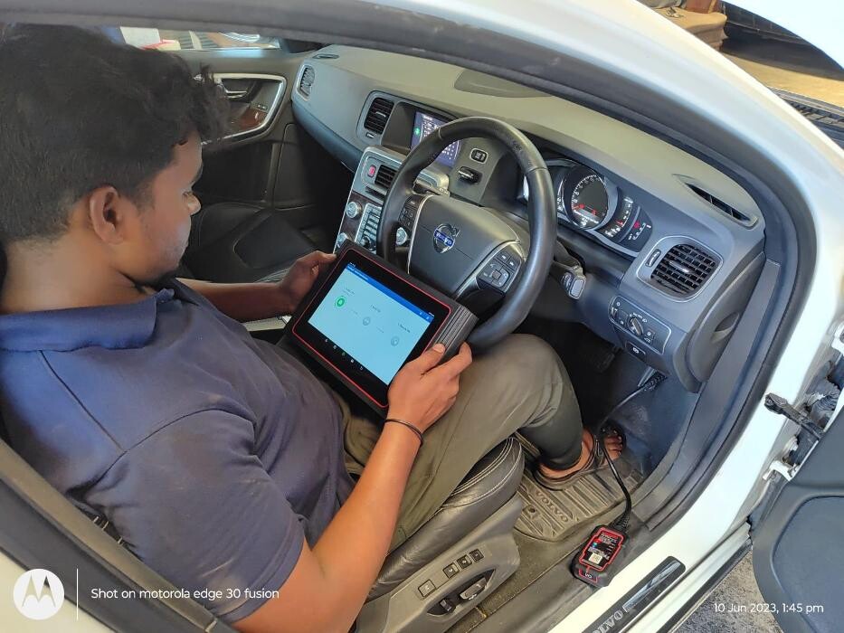 Images i Car Service -The Premier Car Service Center