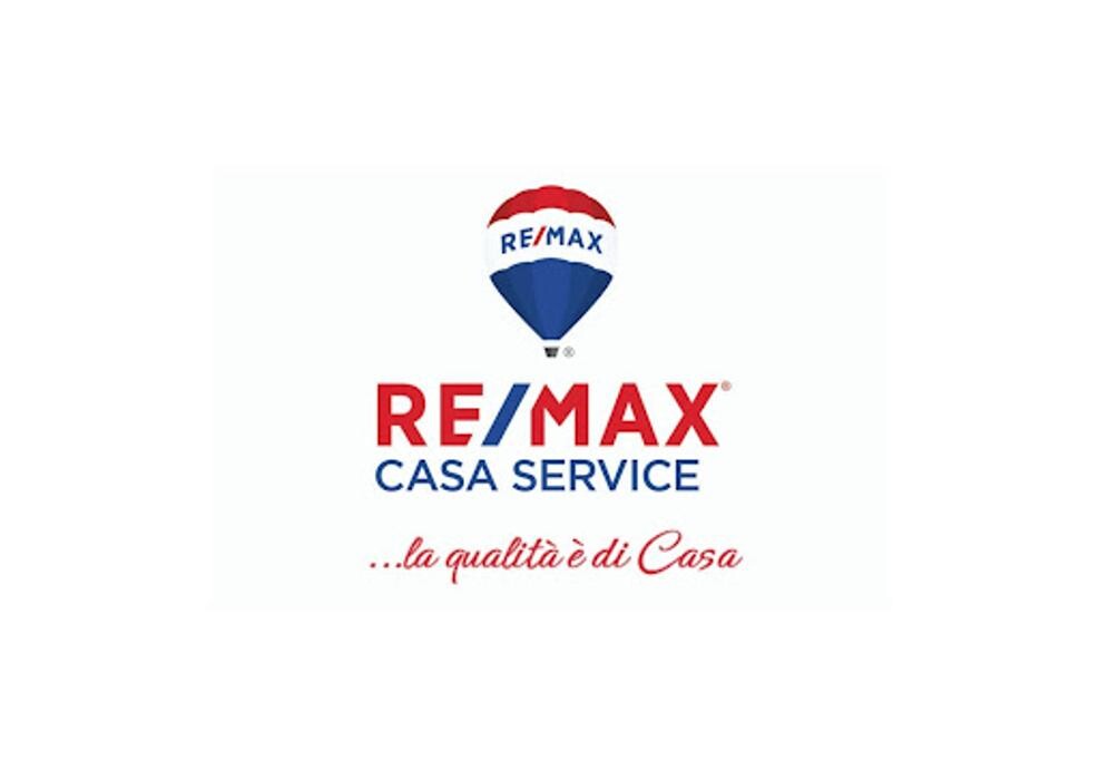 RE/MAX Casa Service Logo