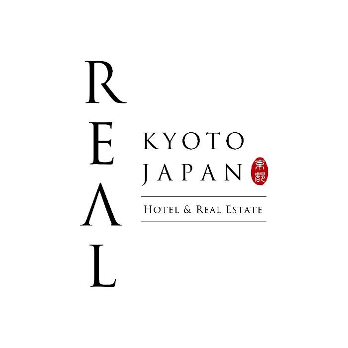 株式会社レアル 本社 Logo