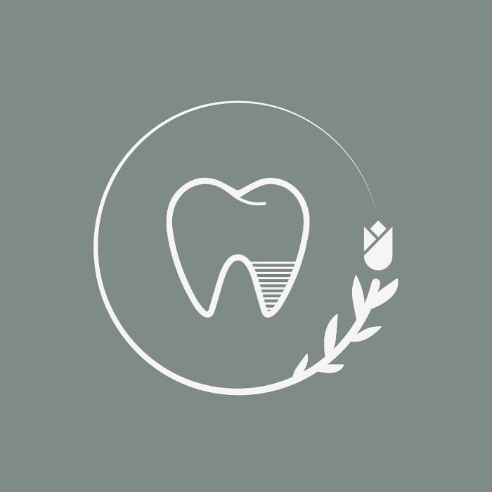 Tulips Periodontics & Dental Implants Logo