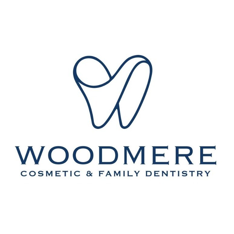 Woodmere Cosmetic and Family Dentistry Logo