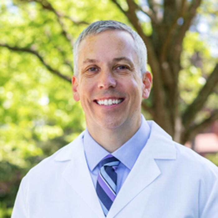 John M. Csokmay, M.D. Logo
