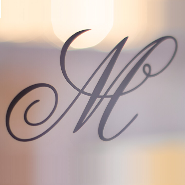 Murray Hill East Suites Logo