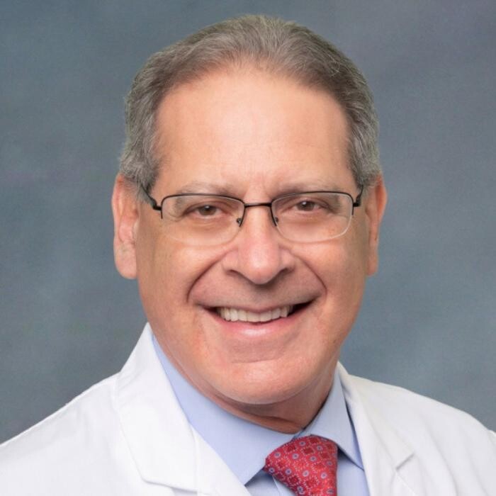 Carl Capelouto, MD Logo