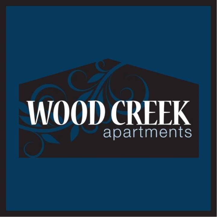 Wood Creek Apartments Logo