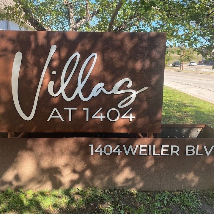 Villas at 1404 Apartments Logo