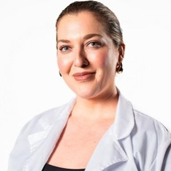 Evangelia Nezis, NP Logo